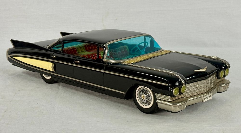 Lot 379: Yonezawa 1960 Cadillac Fleetwood Tin Friction Toy Car