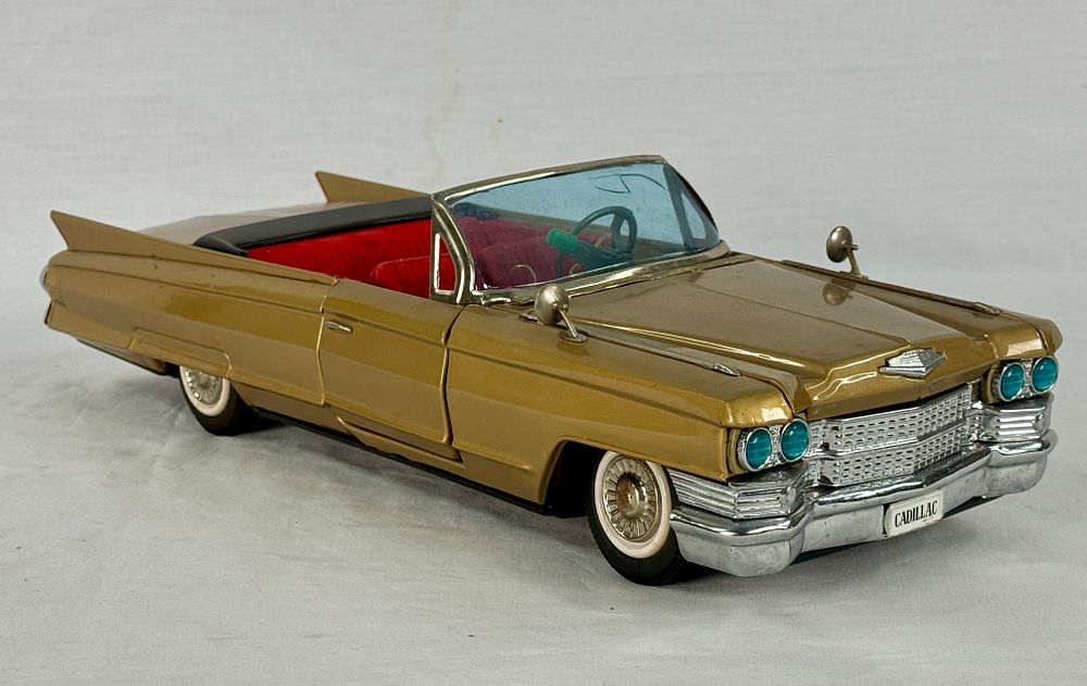 Lot 380: Bandai 1961 Golden Cadillac Convertible Tin Toy Car