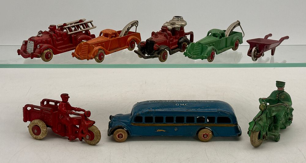 Lot 445: Eight Cast Iron Toy Vehicles