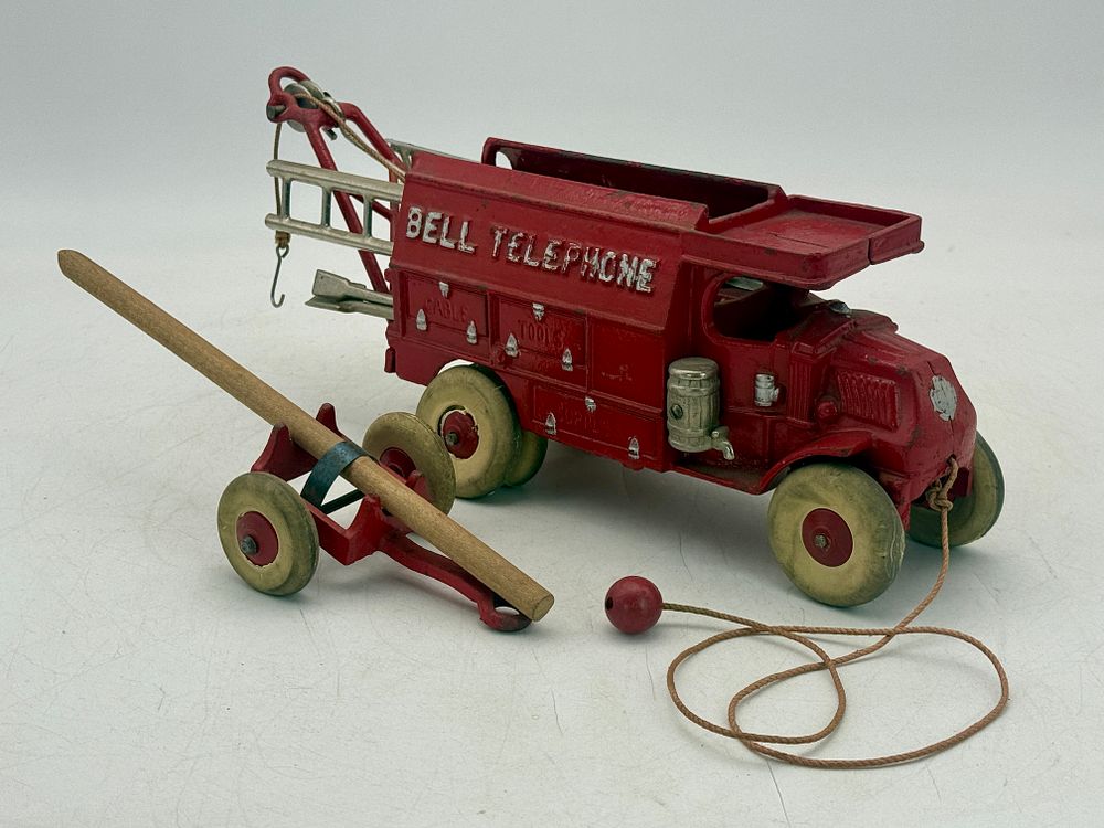 Lot 448: Hubley Cast Iron Bell Telephone Truck and Trailer