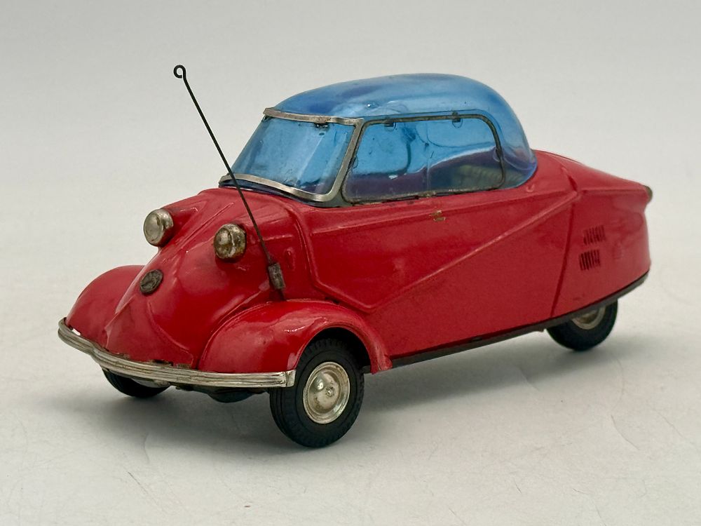 Lot 454: A Bandai Red Tin Messerschmitt KR200 Toy Microcar