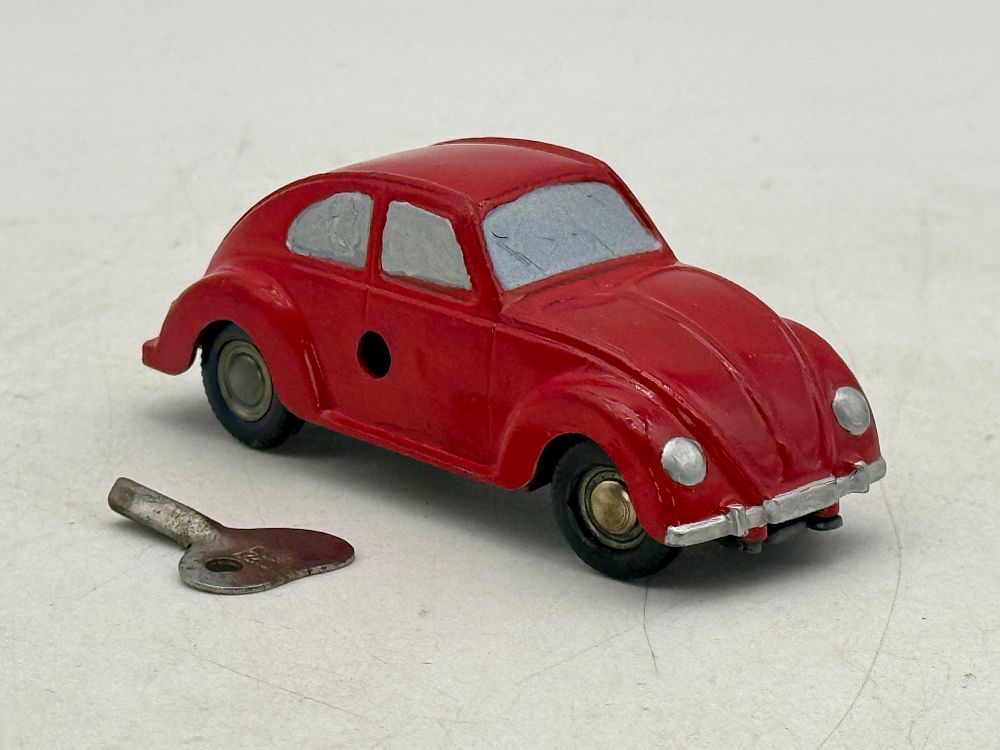 Lot 458: Prameta Red Volkswagen Beetle Wind-Up Toy Car