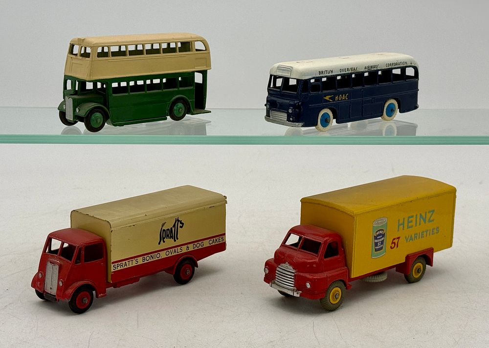 Lot 465: A Group of Four Dinky Toy Vehicles