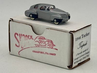 Shrock Toys 1/72 Scale 1946 Tucker Torpedo Model Car. A silver 1/72 scale model of a 1946 Tucker 