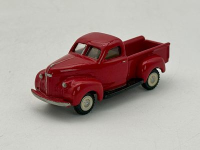 Shrock Model 1939 Studebaker J1 145 pick up red. A red die-cast model Studebaker J1 145 pick up 