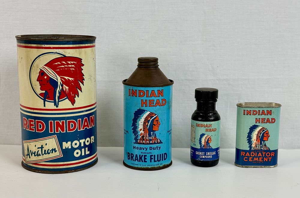Lot 461: A Collection of Vintage Red Indian and Indian Head Containers