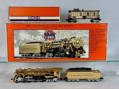 Lionel 100th Anniversary Gold 700E Hudson Locomotive and Caboose Set with Original Boxes. This 