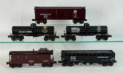 A Set of Williams Electric Trains Crown Edition Brass O-Gauge Freight Cars and Caboose. A set of 