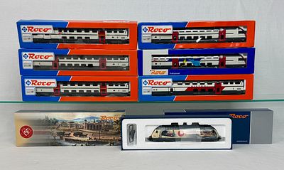A Collection of Seven Roco HO Scale SBB CFF FFS Model Train Items Including Commemorative 
