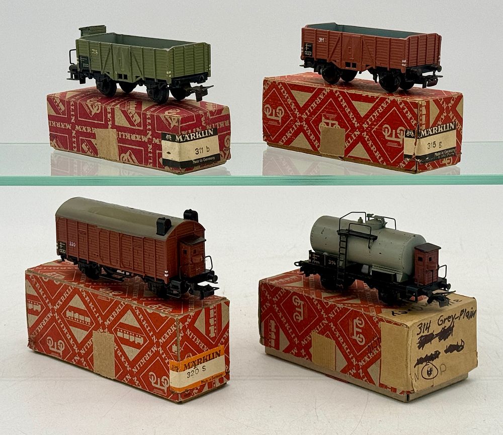 Lot 220: A Collection of Vintage Marklin HO Scale Model Railway Freight Cars with Original Boxes
