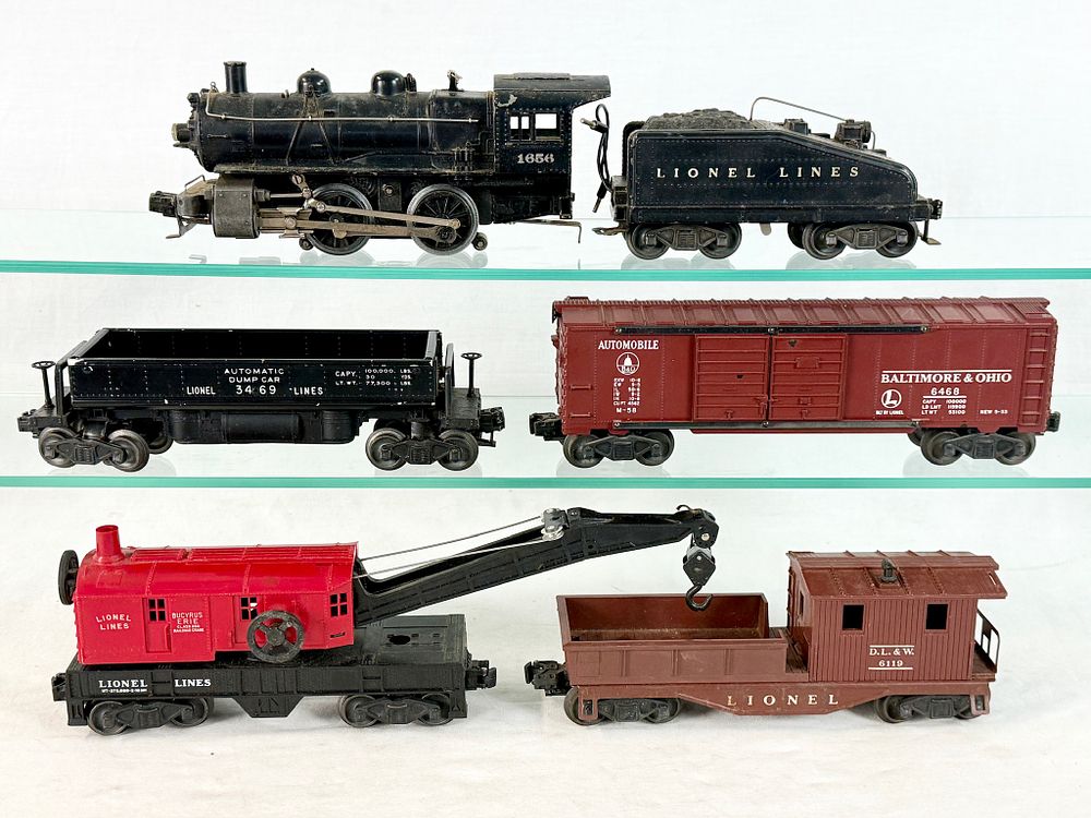 Lot 386: A Collection of Lionel Postwar O27 Gauge Model Train Equipment with Original Boxes