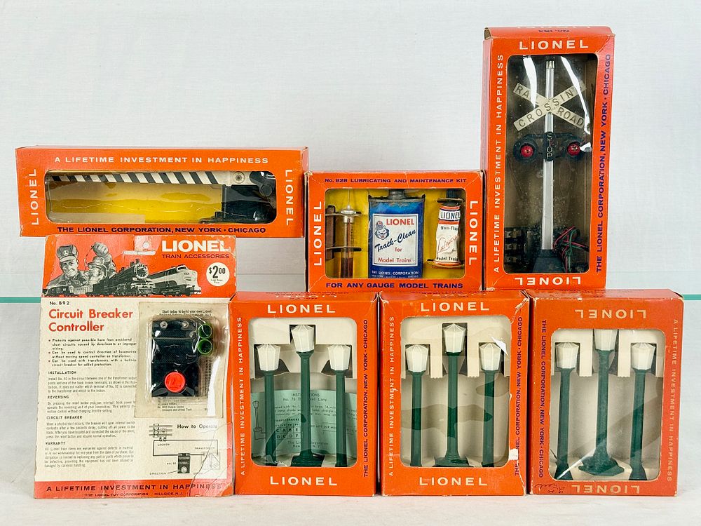 Lot 402: A Collection of Seven Vintage Lionel O-Gauge Model Railroad Accessories in Original Packaging
