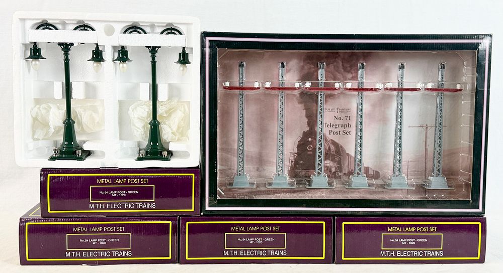 Lot 425: Five M.T.H. Electric Trains Tinplate Traditions Model Train Accessory Sets