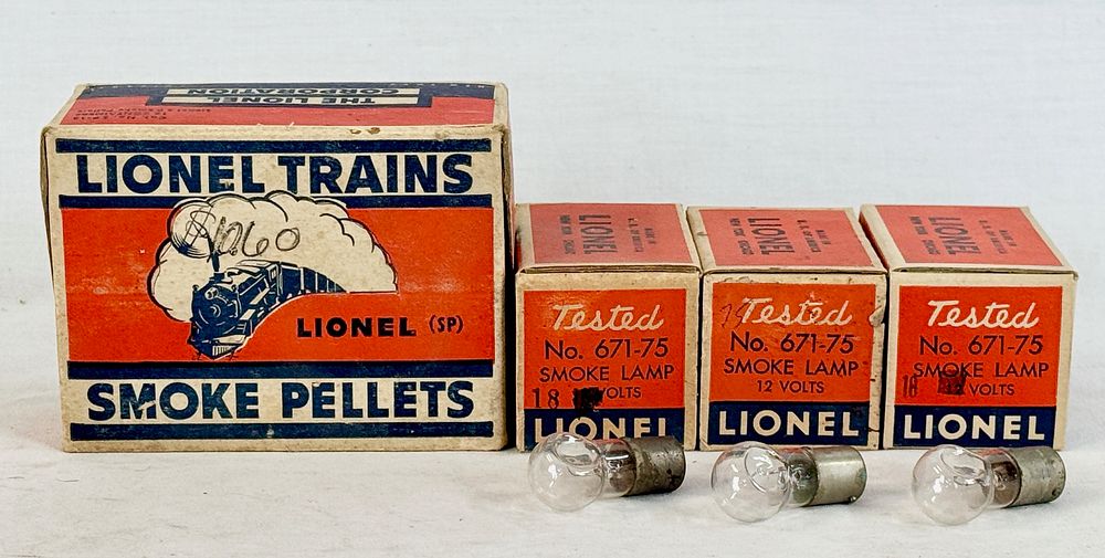Lot 428: A Collection of Vintage Lionel Postwar Smoke Pellets and Smoke Lamps with Original Boxes