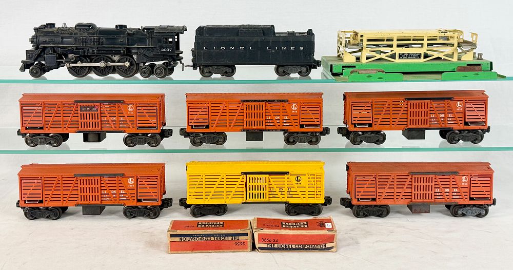 Lot 482: Lionel Postwar O Gauge Steam Locomotive and No. 3656 Operating Cattle Cars with Stockyard