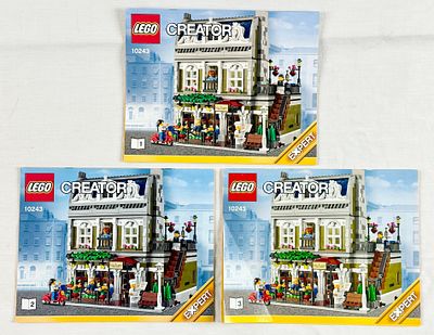 LEGO Creator Expert Parisian Restaurant Set 10243 with Manuals. This lot features a disassembled 