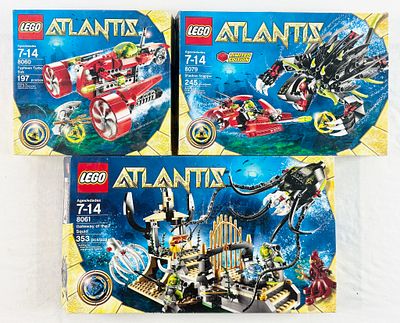 Three LEGO Atlantis Theme Construction Sets, Models 8060, 8079, and 8061. A trio of construction 