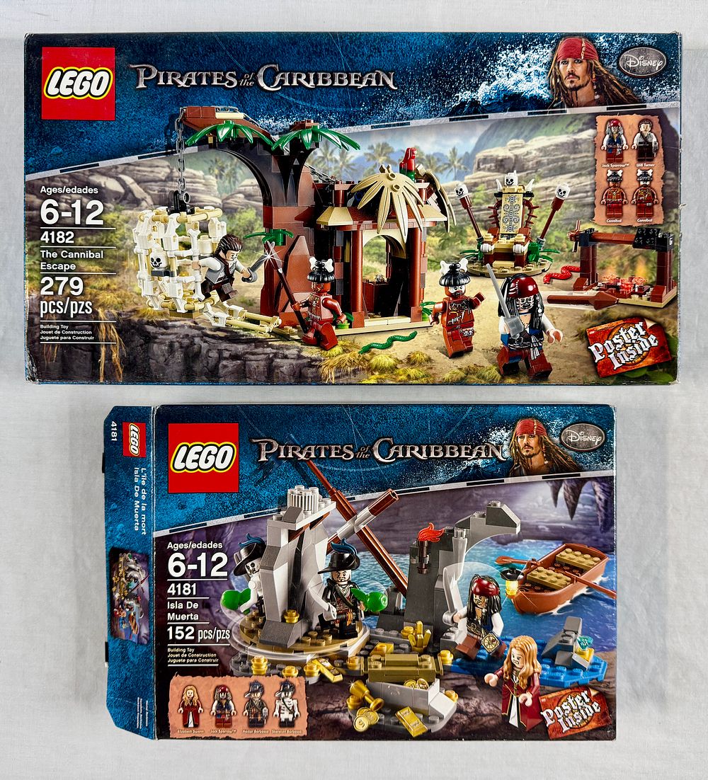 Lot 180: A Pair of LEGO Pirates of the Caribbean Building Sets, 4181 Isla De Muerta and 4182 The Cannibal Escape