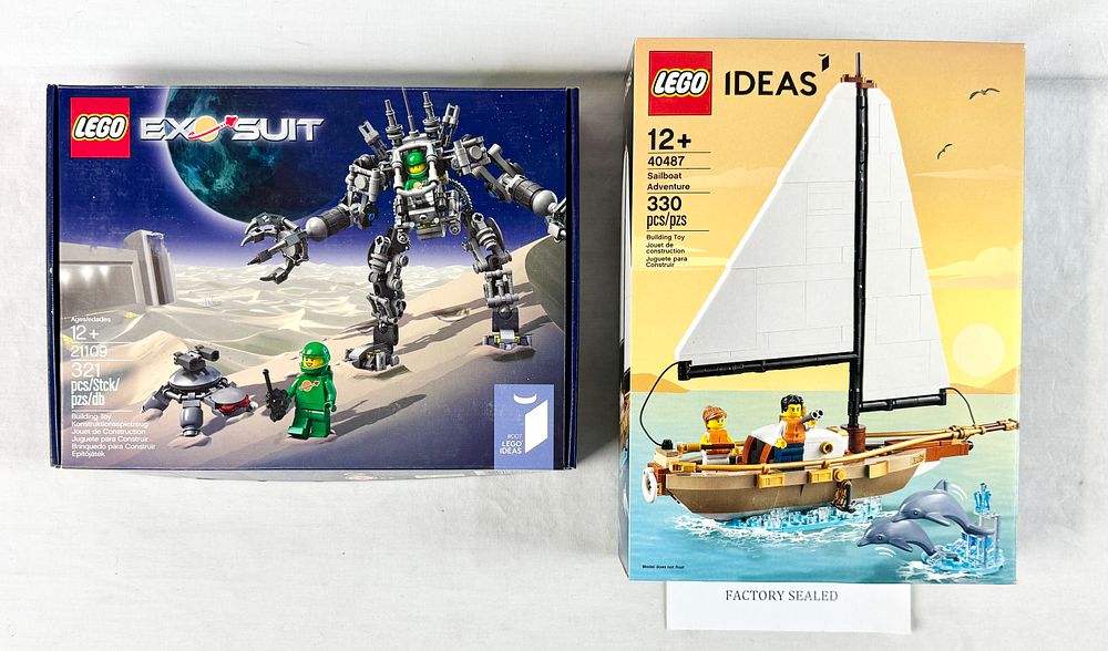 Lot 302: A Pair of LEGO Ideas Building Sets Including Exo Suit 21109 and Sailboat Adventure 40487