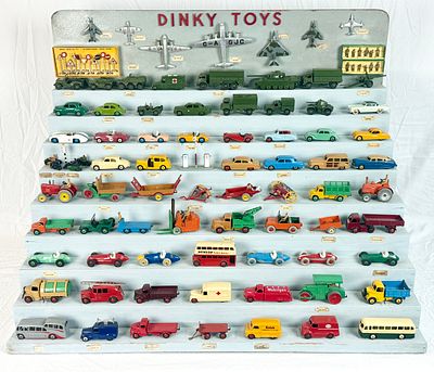 Vintage 1950s Dinky Toys on Tiered Display Store Display. Dinky Toys collection comprising 