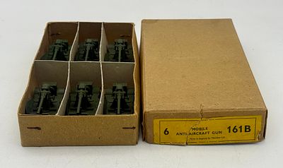 6 Dinky Toys 161B Mobile Anti-Aircraft Guns in Trade box. A group of Dinky Toys 161B Mobile 