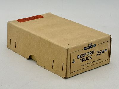 4 Dinky Toys No. 25WM Bedford Trucks in Original Trade Box. A group of Dinky Toys military 