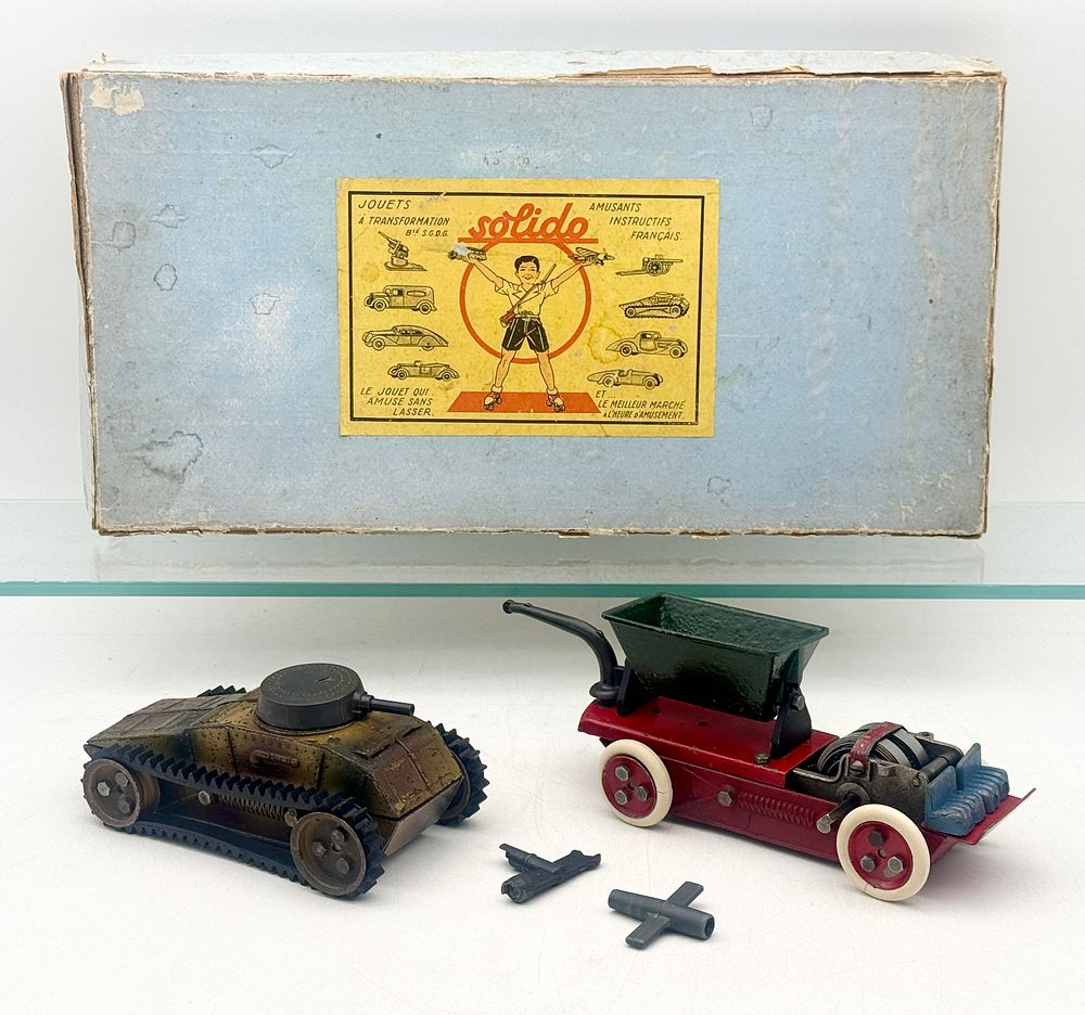 Lot 205: A Group of Vintage Solido Mechanical Transformation Toys with Box