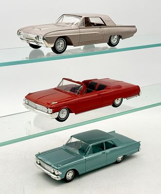 3 AMT Ford promotional model cars . Three AMT Ford promotional model cars constructed from 
