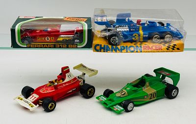 4 Vintage Friction Formula 1 Racing Cars. Lucky Toys and Champion Racer Formula 1 racing cars 