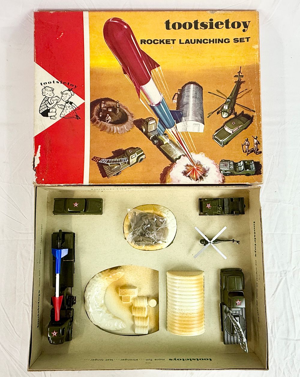Lot 112: Tootsietoy Rocket Launching Set No. 4320 with Original Box