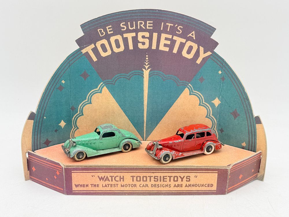 Lot 331: A Pair of Tootsietoy Graham Die-cast Vehicles with Reproduction Display