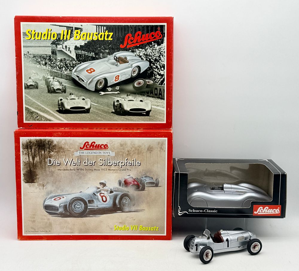 Lot 402: A Collection of Schuco Clockwork Tinplate Construction Kits and Models