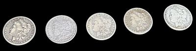 5 ANTIQUE MORGAN SILVER DOLLARS. 26.73 GRAMS, 1883, 1878, 1900, 1882, 1884.