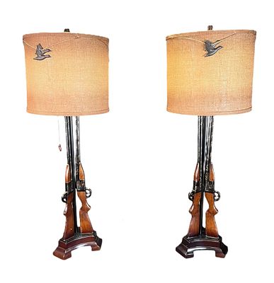 PAIR OF WOODEN GUN LAMPS WITH WOVEN SHADES. Height: 36 in. by Width: 10 in. by Depth: 10 in.