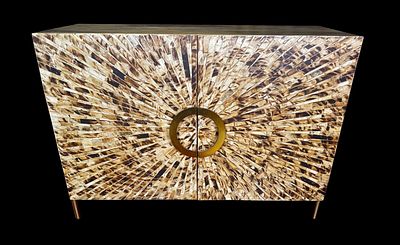MODERN CONSOLE WITH HORN INLAYED DOORS IN A STARBURST PATTERN WITH BRASS HARDWARE. Height: 33.5 