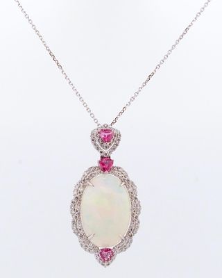 PLATINUM OPAL, PINK SAPPHIRE & DIAMOND PENDANT. PLATINUM 16.63CT OPAL, 3-1.45CT PINK SAPPHIRE 