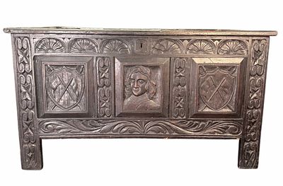 19th CENTURY JACOBEAN STYLE CARVED OAK COFFER. DARK-FINISHED OAK CHEST WITH HINGED PANELED LID 