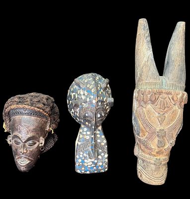 THREE CARVED AND PAINTED MASKS. AFRICAN AND INDIA. THREE CARVED AND PAINTED WALL HANGING MASKS. 