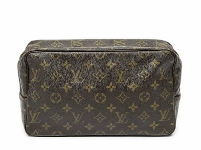 Louis Vuitton Toiletry Pouch Pouch. Made from Monogram Canvas with straps/handles and Golden 