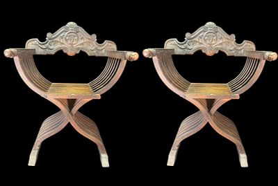 PAIR OF RENAISSANCE REVIAL SAVONAROL ARMCHAIRS. TWO MATCHING CARVED WOODED ARMCHAIRS, LIKELY 