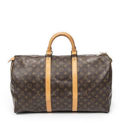 Louis Vuitton Keepall Travel Bag. Made from Monogram Canvas with Vachetta straps/handles and 