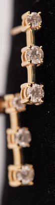 PAIR OF 10KT GOLD DIAMOND DROP EARRINGS. DIAMONDS=+/-0.75CTS. 2.4 GRAMS T.W. #38. Height: 11/16 
