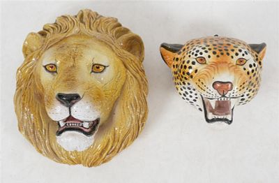 Two Italian Faience Polychromed Masks of a Lion and Cheetah, 20th Century. Each realistically 