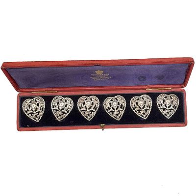 Two sets of boxed Sterling Silver Buttons. The heart shape sterling silver buttons city mark of 