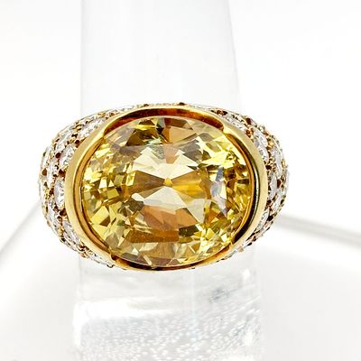 VCA Van Cleef Arpel Yellow Sapphire Gold and Diamond Ring. 18K Yellow gold ring with a large 