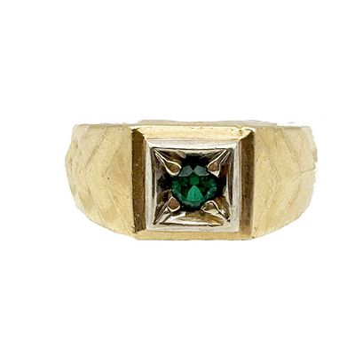 Men's 14K Gold Green Stone Ring. The ring has a green glass stone set into a 14K yellow gold 