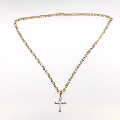 14K Yellow and white gold Diamond Cross Necklace. The cross measures 1.50inches x 0.75inches. 
