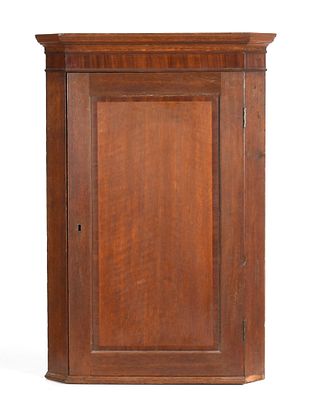 George III Oak and Mahogany Hanging Corner Cupboard, Late 18th Century. A George III Oak and 