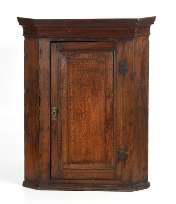 George III Oak and Mahogany Hanging Corner Cupboard, Late 18th Century. A George III Oak and 