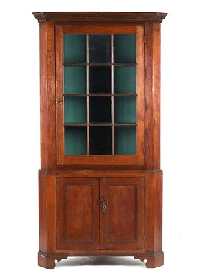 Pennsylvania Chippendale Cherry Two-Part Corner Cupboard, Early 19th Century. A Pennsylvania 